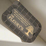 black stained crib board with a tree of life engraving