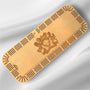 Wooden cribbage board with a crest design on a gray background