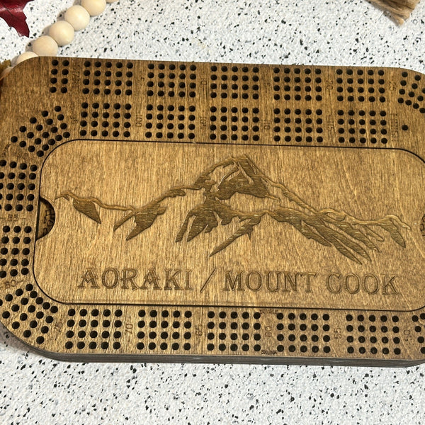 4 player crib board with mountain range engraving