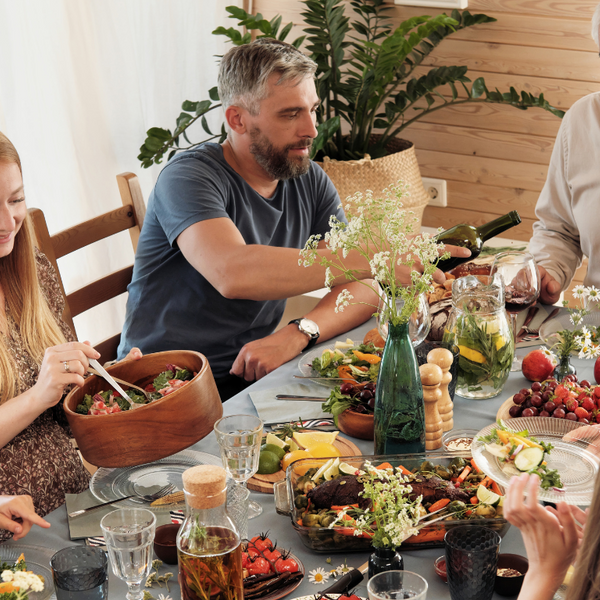 an image of afamily having dinner together