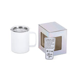 White tumbler with a care instructions card in front of its packaging on a white background
