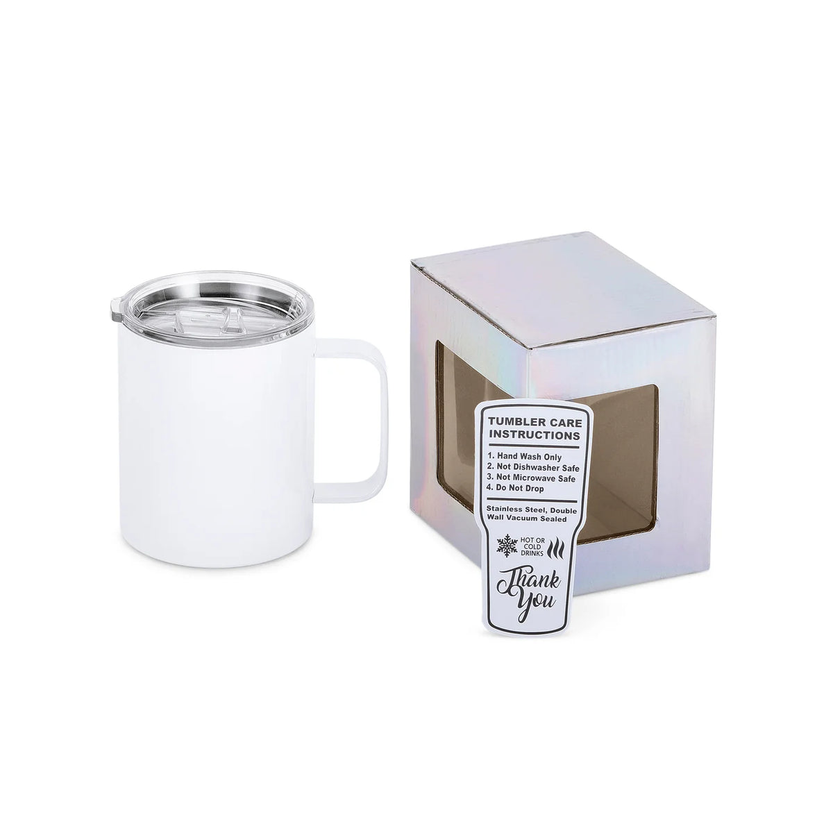 White tumbler with a care instructions card in front of its packaging on a white background