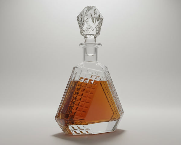 Crystal decanter with geometric design on a white background