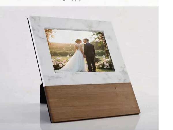 Marble and wood frame with a 5x7 photo of a couple in a garden.