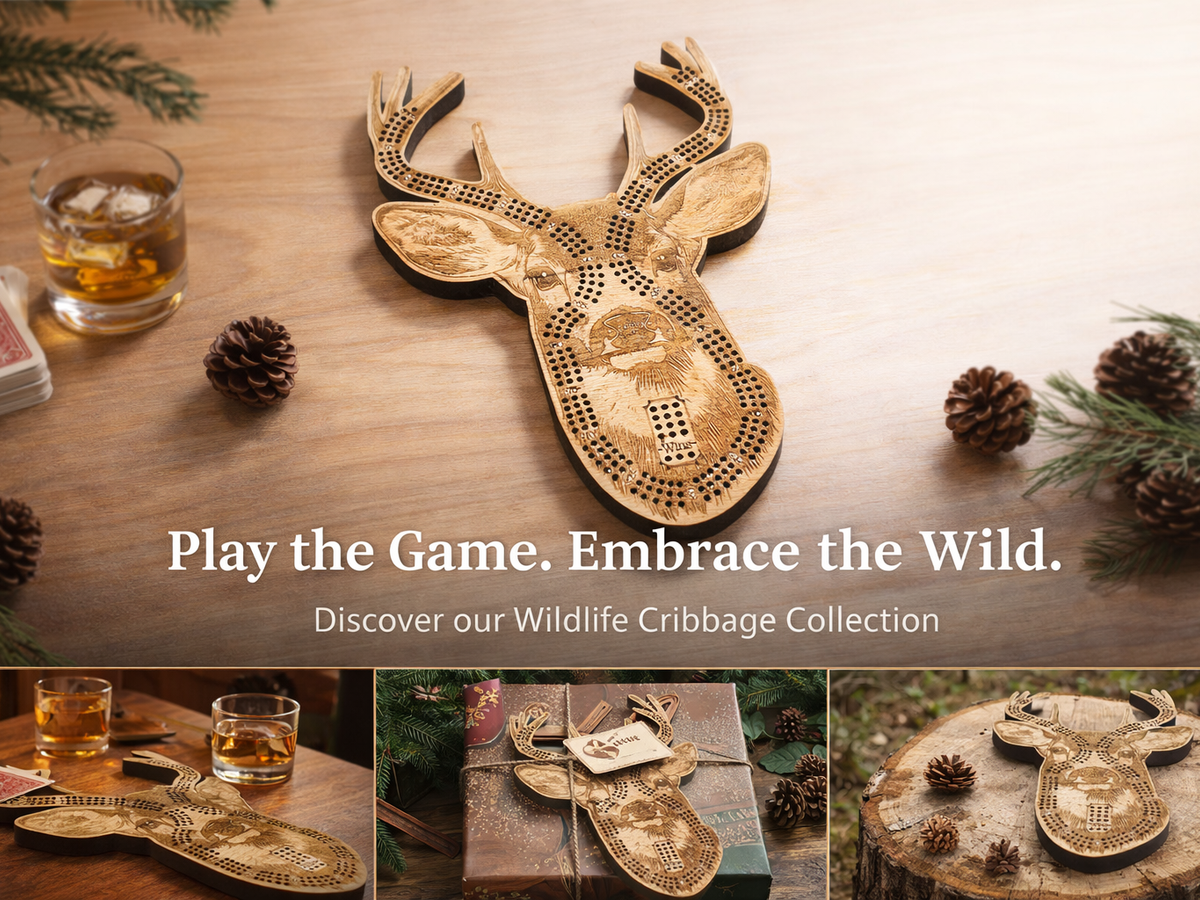 Wooden deer-shaped cribbage board on a wooden surface with glasses and cards, surrounded by pine cones and branches.