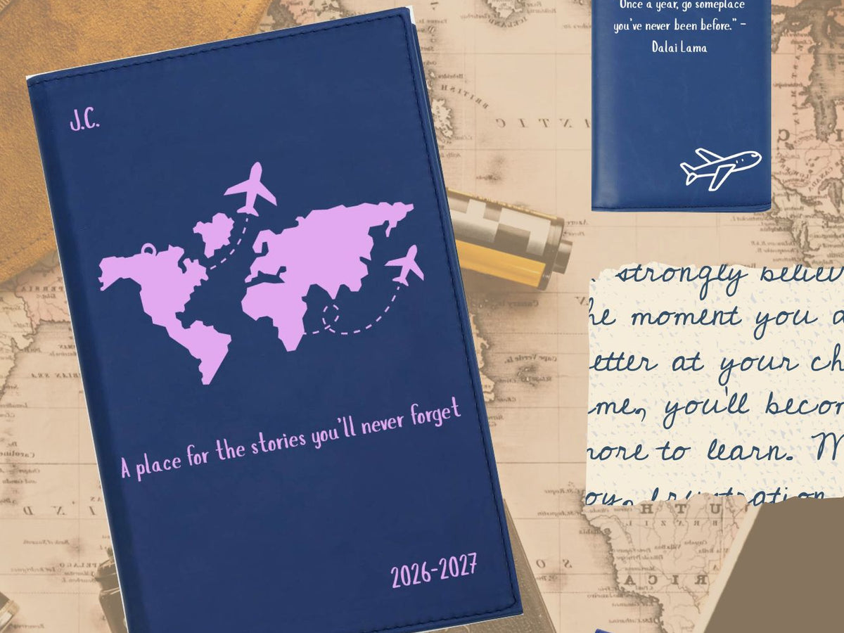 Blue travel journal with world map design on a vintage map background