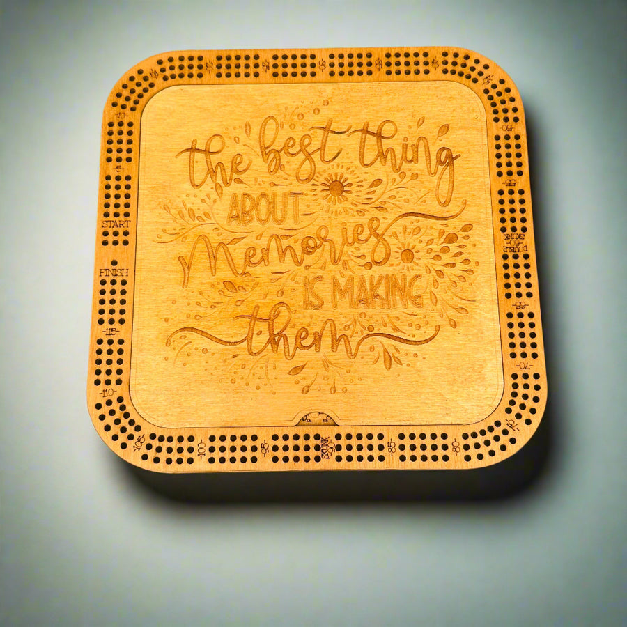 Wooden coaster with engraved text on a gray background