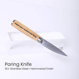 Paring knife with wooden handle on a white background