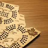 Close up image of the Manitoba Cribbage Board 