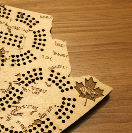 Close up image of the Manitoba Cribbage Board 