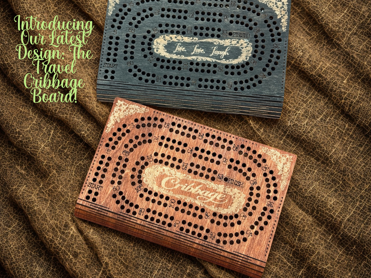 Two wooden cribbage boards on a brown fabric background with text introducing the latest design.