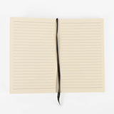 Open notebook with lined pages on a white background