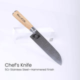 Chef's knife with wooden handle on a white background