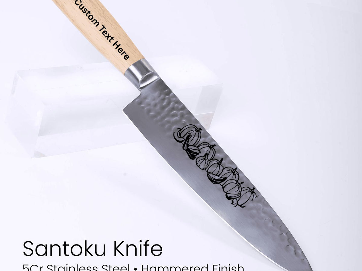 Santoku knife with wooden handle on a white background