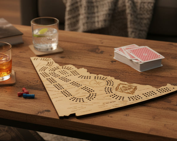 Wooden map of Yukon with cut-out design on a beige background
