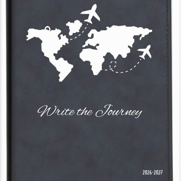 Journal with world map and airplane illustrations on a dark blue cover