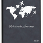 Journal with world map and airplane illustrations on a dark blue cover