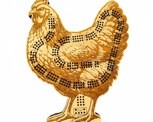 Gold-colored chicken-shaped object with black dot patterns on a white background