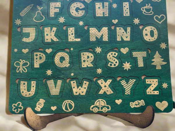 green wood stained letter puzzle