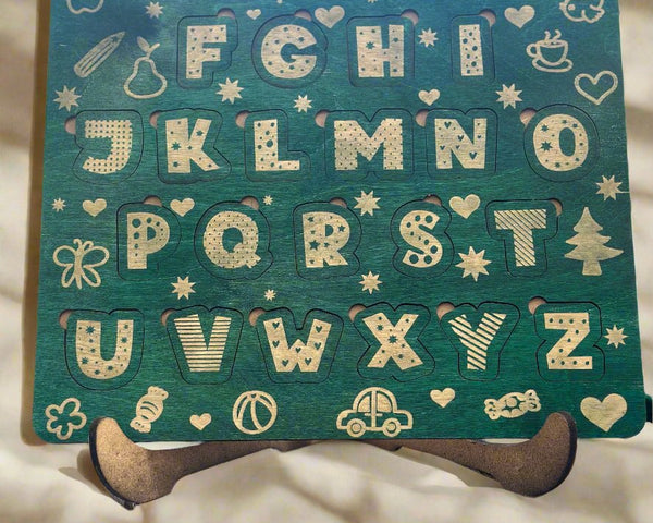 green wood stained letter puzzle