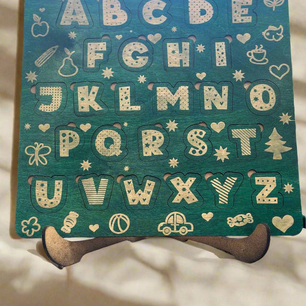green wood stained letter puzzle