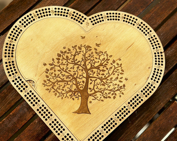 cribbage board withmaple stain and tree of life engraving