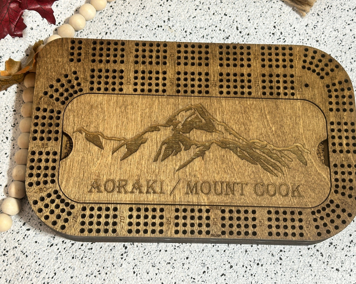 4 player crib board with mountain range engraving