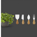 Set of four wooden-handled cheese tools with metal heads next to a potted plant on a dark background