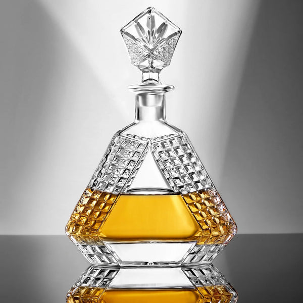 Crystal decanter with geometric design on a reflective surface