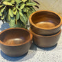 an image of three wooden bowls size 6 in. wide x 3 in.tall approximately